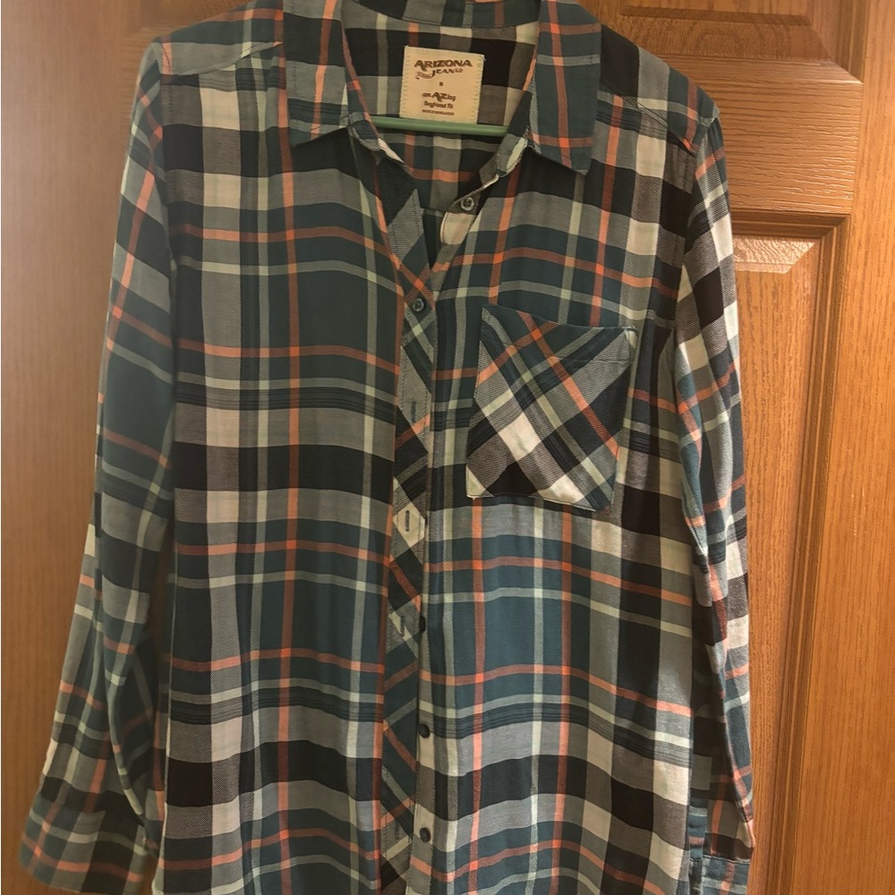 Size medium blue flannel with pink and white.